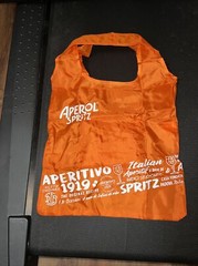 Aperol vinyl tote bag 15 by 15 inch. Opens From 7 Inch Pouch Free Ship USA