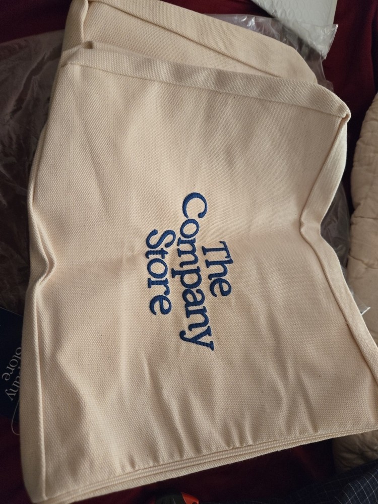 The Company Store canvas tote bag in natural with embroidered blue lettering x 2