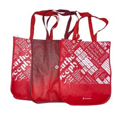 Three red and white lululemon reusable tote bags 16 x 14 inches