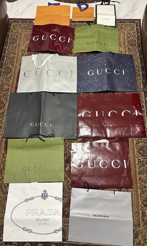 Assorted Designer Shopping Bags: Gucci; Louis Vuitton