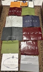 Assorted Designer Shopping Bags: Gucci; Louis Vuitton