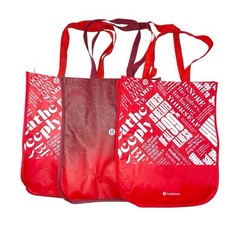 Three red and white lululemon reusable tote bags 16 x 14 inches