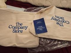 The Company Store canvas tote bag in natural with embroidered blue lettering x 2