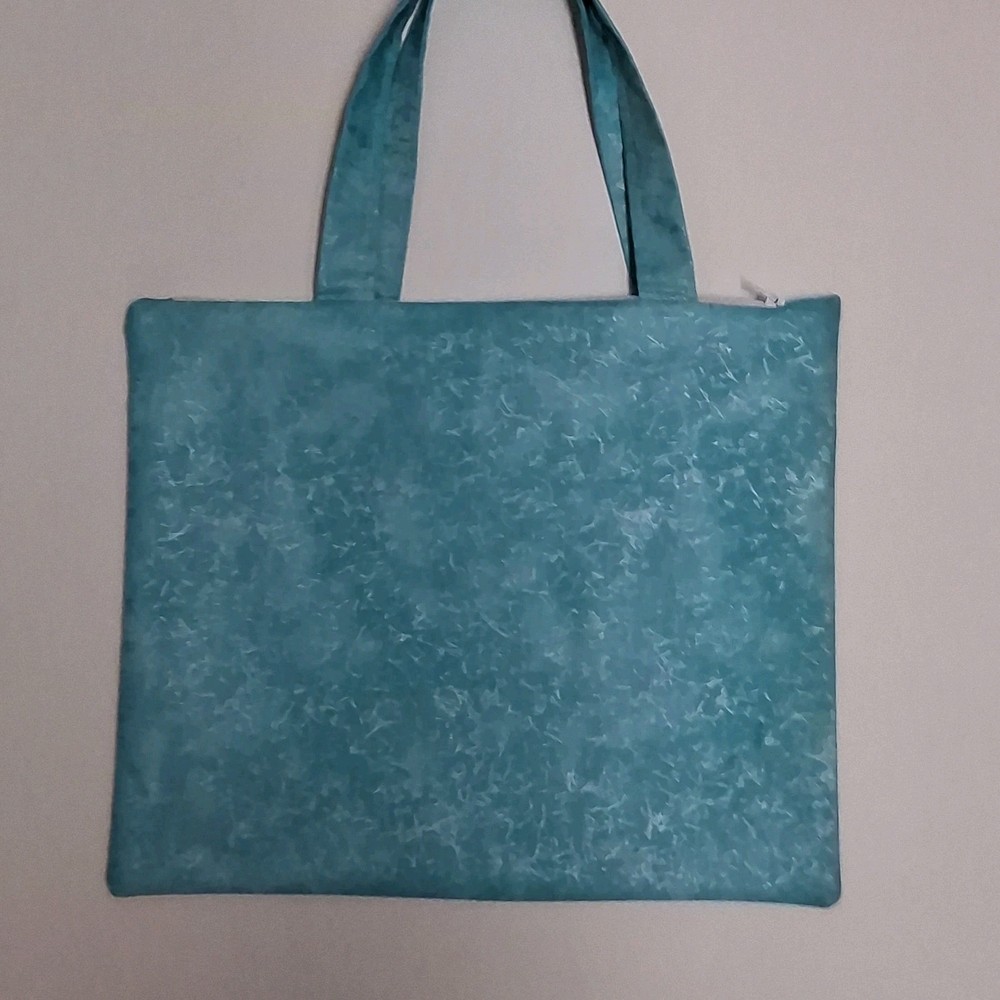 Blue and silver totebag with handles
