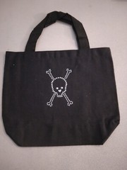 Black bag with silver skull cross bones 275498