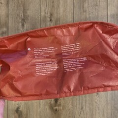 Lululemon red reusable bag button close
