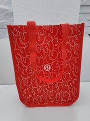 Lululemon Small Logo Reusable Shoppers Bag Red w/ logos all over front and back.